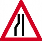 road narrows left c/w channel